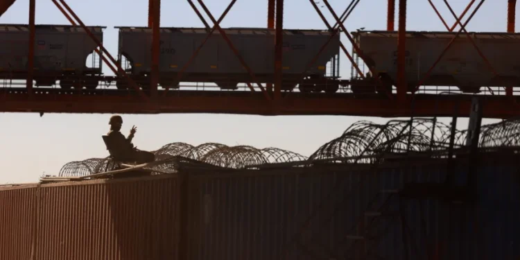 Railroad Worker Accused of Smuggling Migrants on Cargo Trains